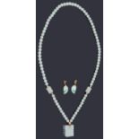 A contemporary Chinese pale celadon jade bead necklace