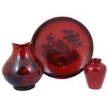 A Royal Doulton flambé 'Woodcut' vase, dish and another