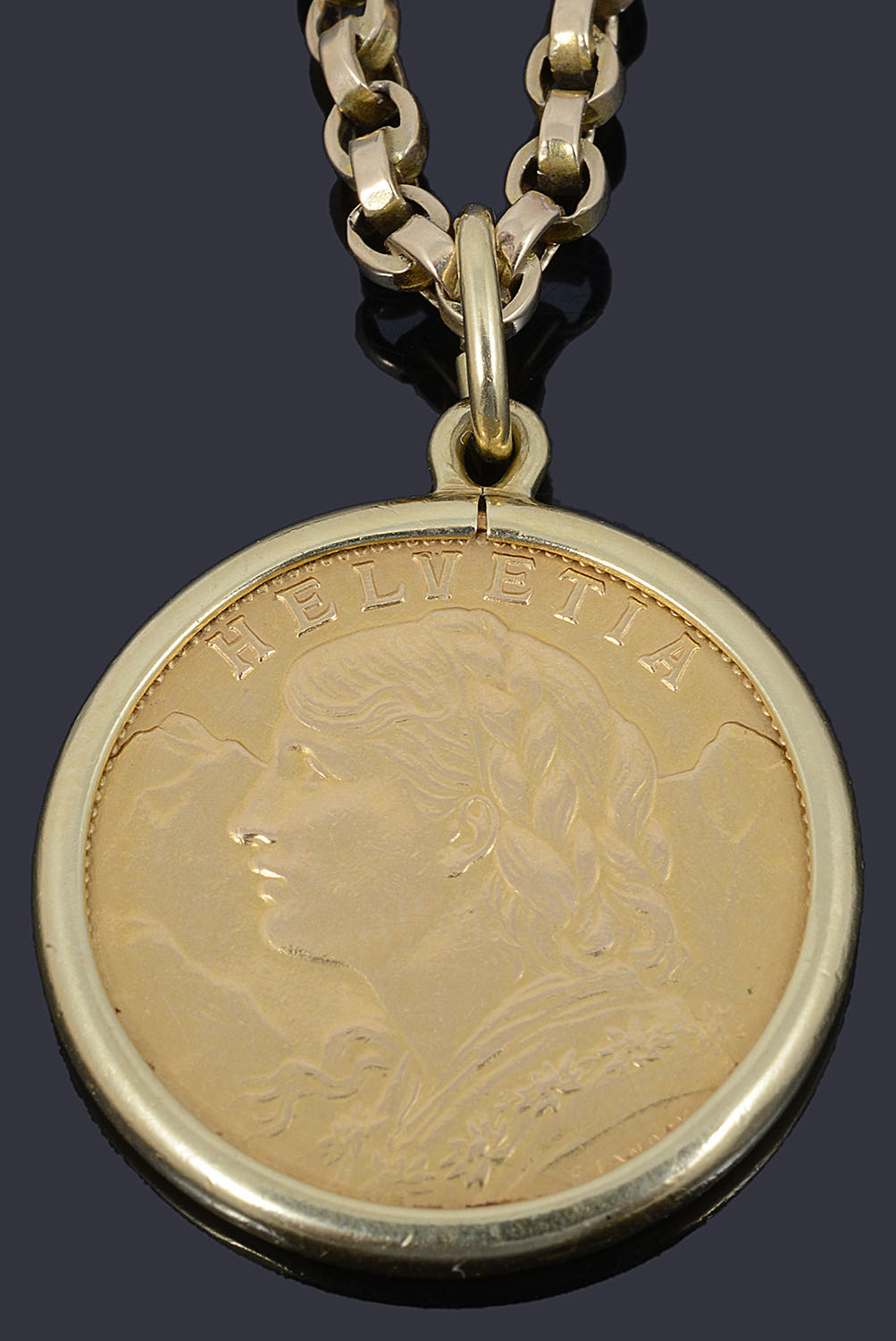 A 1947 Swiss two Franc fine gold coin on chain