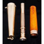 A 9ct gold cheroot case and 9ct gold cigar piercer