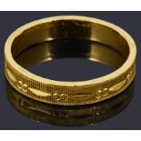 A Chinese 24ct gold wedding band