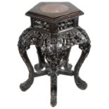 A late 19th c Chinese carved hardwood low stand or occasional table
