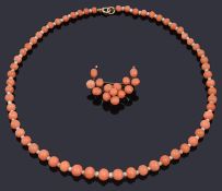 A delicate coral and seed pearl necklace and coral brooch