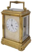 A late 19th century French gilt brass repeating carriage clock