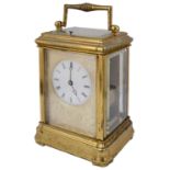 A late 19th century French gilt brass repeating carriage clock