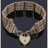 A contemporary fancy twist link gate bracelet