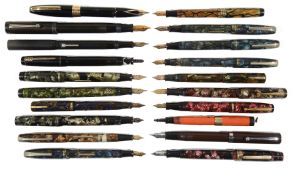 Collection of mottled and plain fountain pens / propelling pencils