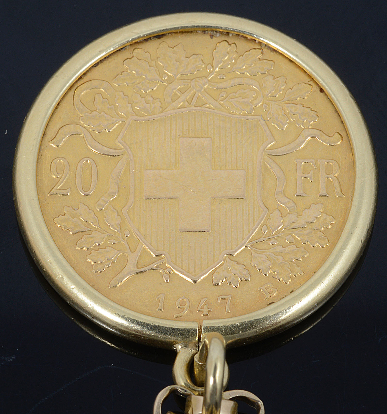A 1947 Swiss two Franc fine gold coin on chain - Image 2 of 2
