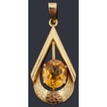 A modernist yellow metal gem set pendant