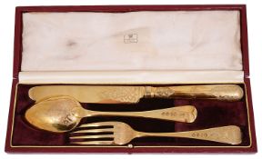 An early Victorian silver gilt knife fork and spoon set