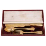 An early Victorian silver gilt knife fork and spoon set