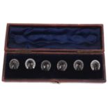 An unusual set of Vict. Whitby jet and silver horseshoe dress studs