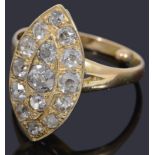 An attractive gold marquise shaped diamond cluster ring