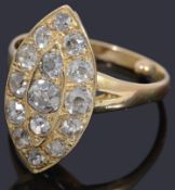 An attractive gold marquise shaped diamond cluster ring