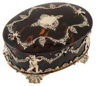 A late Victorian silver mounted tortoiseshell oval jewellery box