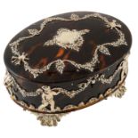 A late Victorian silver mounted tortoiseshell oval jewellery box
