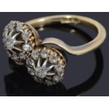 A gold diamond cluster crossover ring