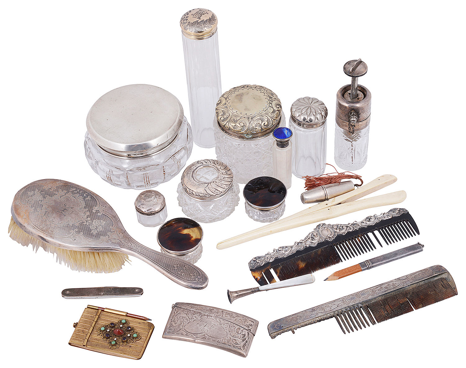 A selection of early 20th c. mostly silver items of vertu and mostly silver dressing table items