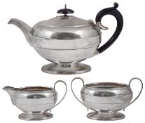 A George V silver three piece tea service