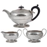 A George V silver three piece tea service