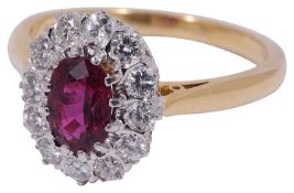 An attractive 18ct gold ruby and diamond cluster ring