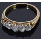A gold five stone diamond ring