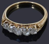 A gold five stone diamond ring