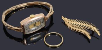 A small collection of gold jewellery items