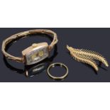 A small collection of gold jewellery items