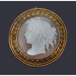 A Victorian Etruscan revival style circular shell cameo brooch