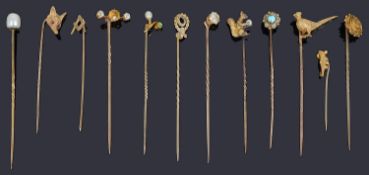 Twelve assorted Victorian and later stick pins,