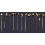 Twelve assorted Victorian and later stick pins,