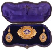 A Victorian gold Etruscan revivial style shield brooch and matching earrings, circa 1860