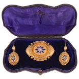 A Victorian gold Etruscan revivial style shield brooch and matching earrings, circa 1860