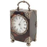 A late 19th/early 20th c. continental silver mounted tortoiseshell carriage clock