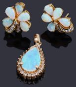 A pair of gold opal and diamond floral earrings and a similar opal and diamond pendant,