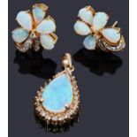 A pair of gold opal and diamond floral earrings and a similar opal and diamond pendant,