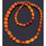 A single row graduated amber bead necklace
