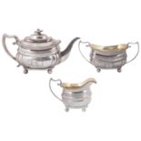 A George III silver three piece tea service