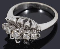 An attractive five stone graduated diamond ring