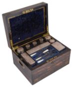 An early Victorian ladies coromandel and brass inlaid dressing box with silver mounted fittings