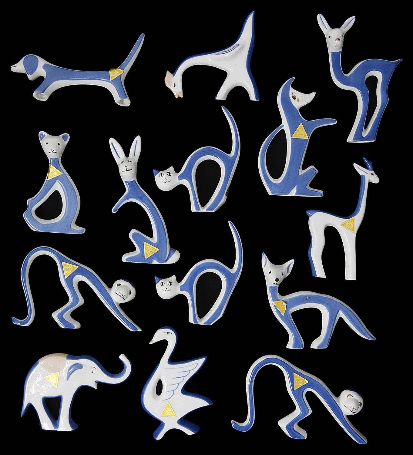 A collection of Royal Dux stylised animals