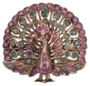 A decorative Indian silver gilt ruby and emerald peacock brooch/pendant