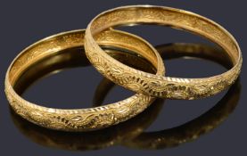 Two Indian high carat slave bangles