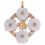 A Chinese gold jade circular pendant