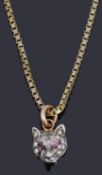 A diamond and ruby set fox head charm/pendant on chain