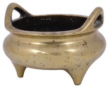 A 19th century Chinese polished bronze censer