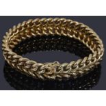 A gold two row curb link bracelet