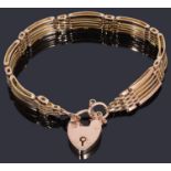 A 9ct gold five row gate link bracelet with padlock,