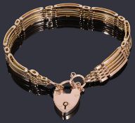 A 9ct gold five row gate link bracelet with padlock,